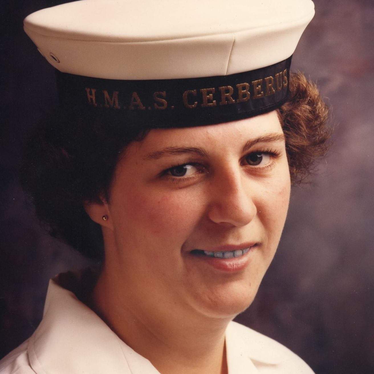 A younger Cheryl in her Navy uniform.